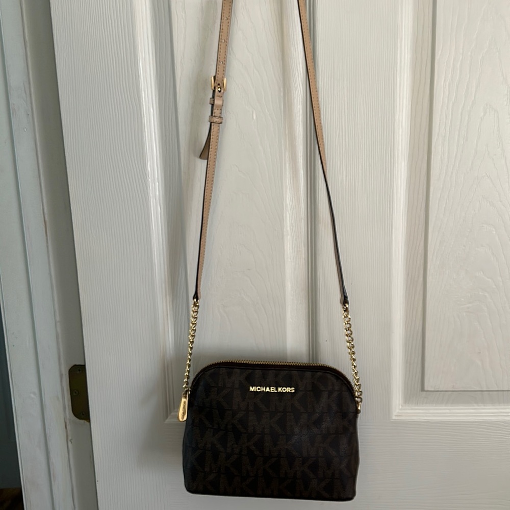 Authentic Michael Kors adjustable shoulder bag.